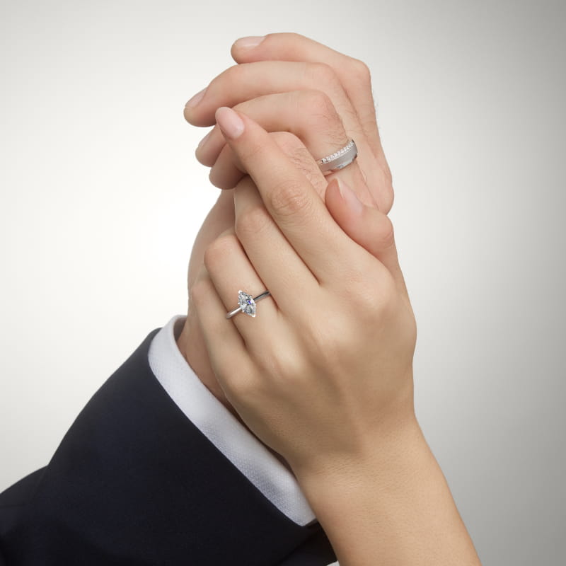 Petite Solitaire Engagement Ring in Platinum