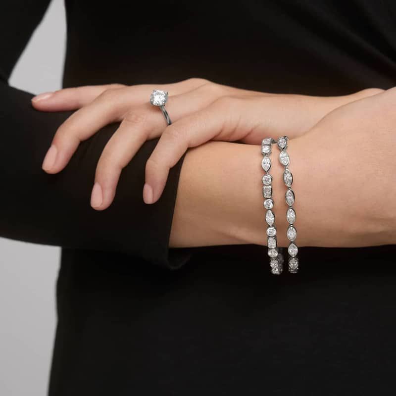 East-West Bezel Tennis Bracelet With 8 CTW Marquise Cut Diamonds in Platinum