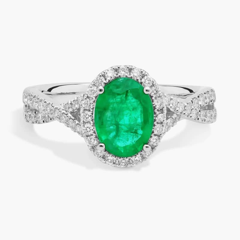 Oval Emerald and Diamond Halo Twist Ring (8x6mm)