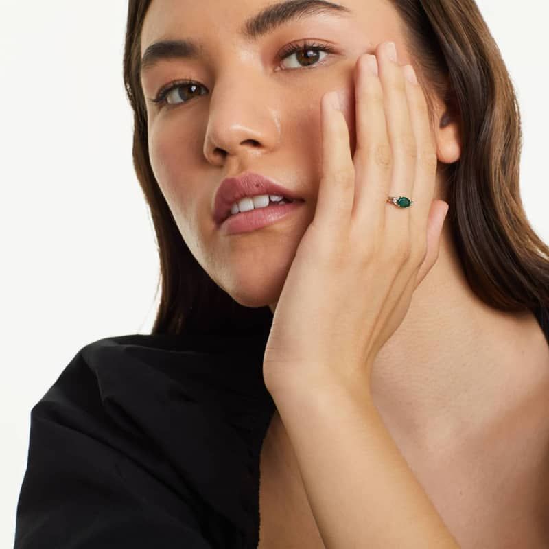 Oval Emerald And Diamond Accent Birthstone Ring In 14K Yellow Gold